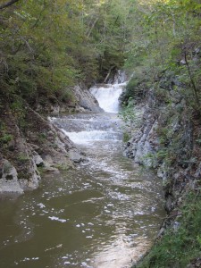 a series of waterfalls on a creek