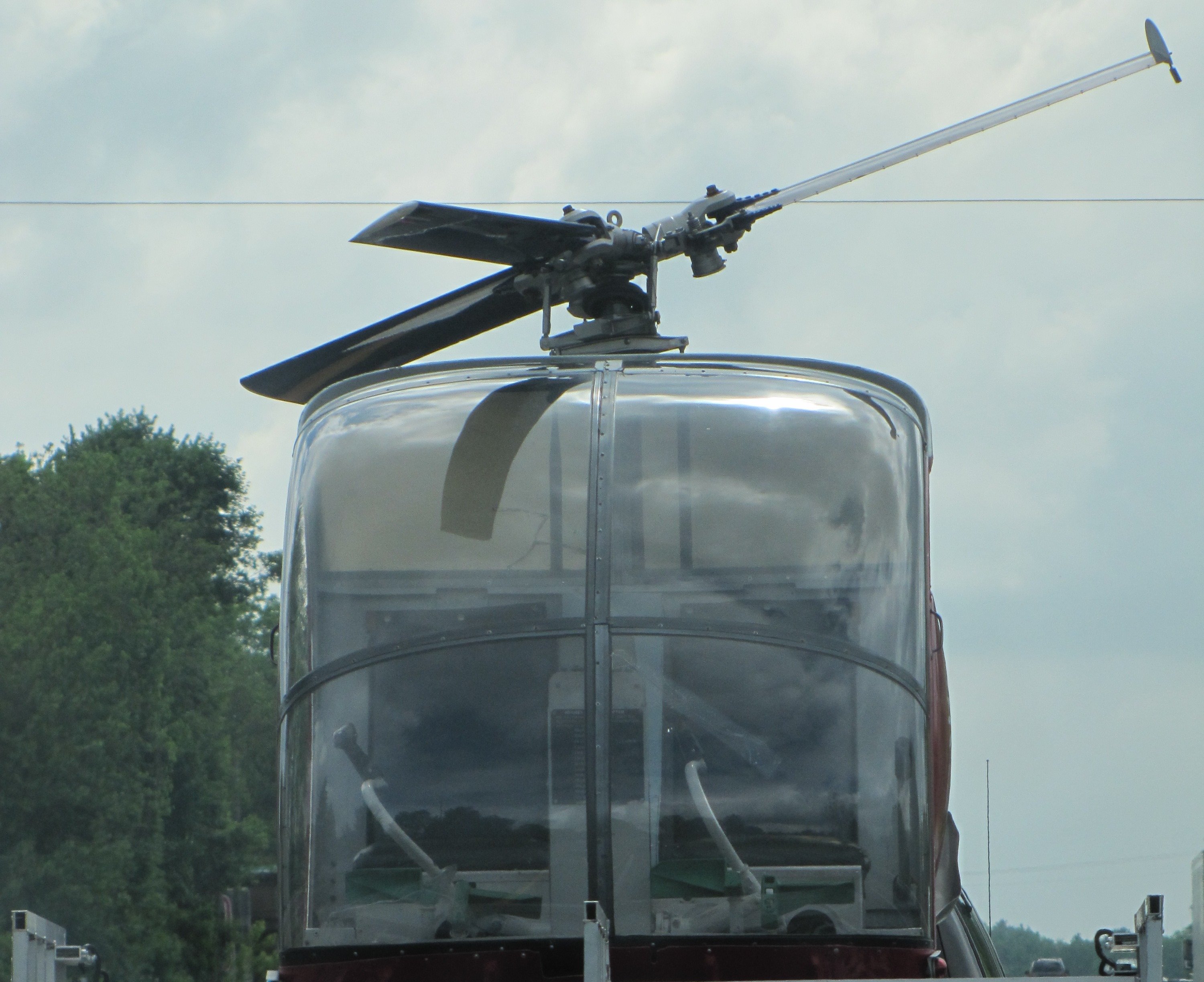 an empty helicopter cockpit as viewed from in front